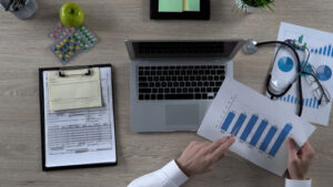 An image of a statistician working at a computer for our article on salaries for those with an MPH